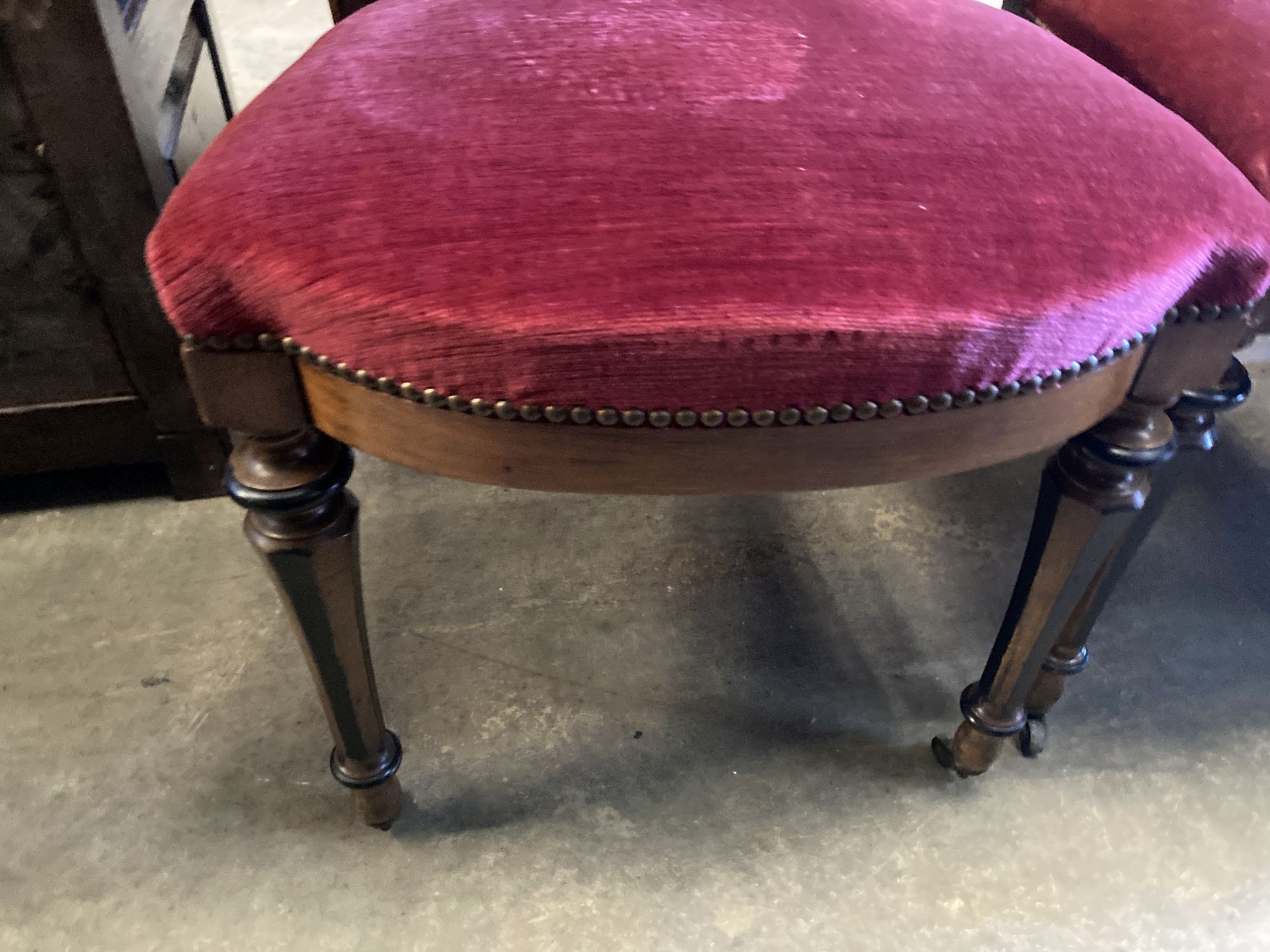 A set of twelve 19th century Continental walnut part ebonised carved walnut dining chairs